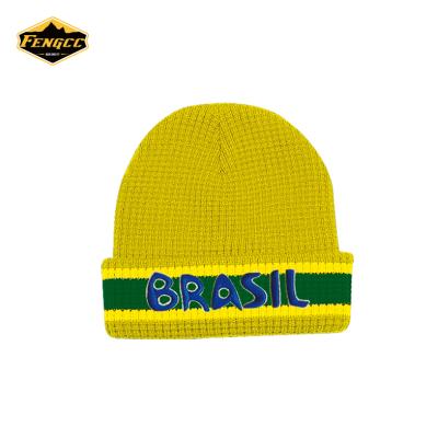 China Brazil JOINT Design Yellow Knitted Beanies Hats With Green Embroidery Logo for sale