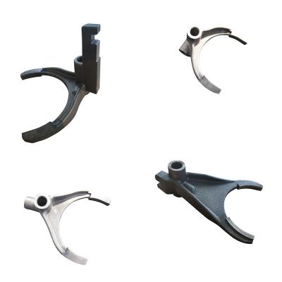 China Tractot Parts OEM Casting Parts OEM Casting Yoke Foundry Green Sand Parts Shifting Malleable Iron for sale