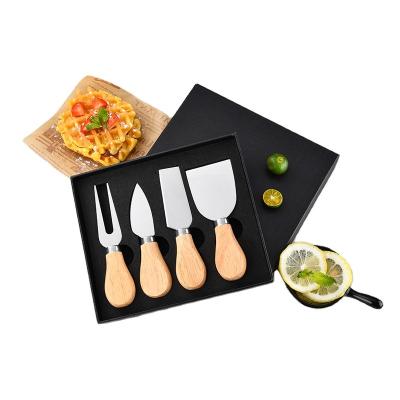 China Unique Viable 4pcs Cheese Knife Tool Kit Wooden Handle Stainless Steel Rubber Cheese Knife Set For Butter Pizza for sale