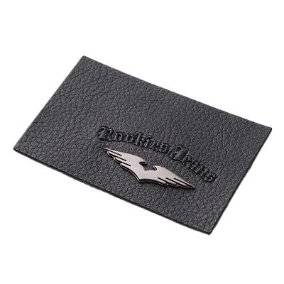 China Viable Faux PU Leather Patch For Denim Pants Jeans, Metal Wing Embossed Customized Logo for sale