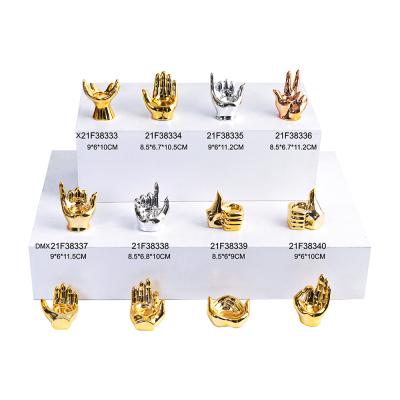 China Europe Style Custom New Gold Ceramic Buddha Hand Candle Holder for sale