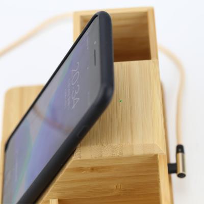 China Smart Cell Phone High Power Led Smallest Lightweight Small Connector Organizer Mobile Phone Built In Bamboo Wood Phone Holder Wireless Charger For Android for sale