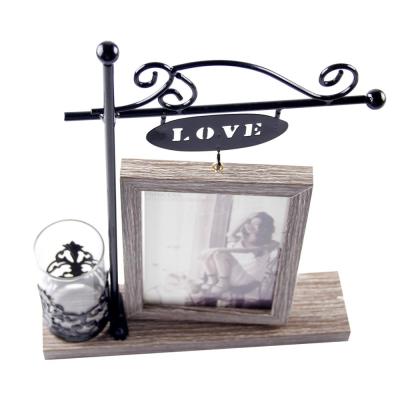 China Decorative Simple Pastoral Picture Frame Frame Wrought Iron Leaves Hydroponic Glass With Table Decoration Desktop for sale