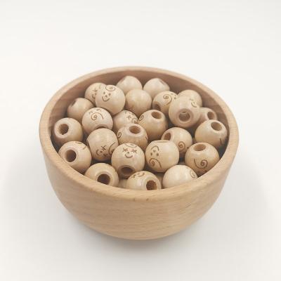 China Europe 20mm Diameter Double Side Engraved Custom Round Natural Wooden Organic Beads for sale