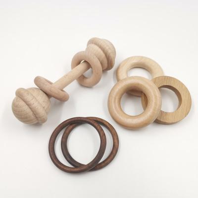 China Europe OEM Supply Custom Organic Montessori Wood Styled Baby Rattle With 2 Shake Rings for sale