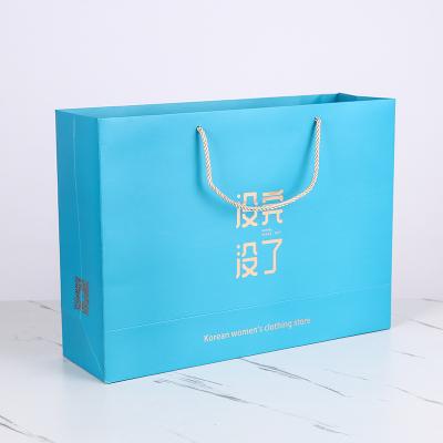 China Custom Price Factory Direct Recycled Materials Paper Bag Luxury With LOGO Shopping Paper Bag for sale