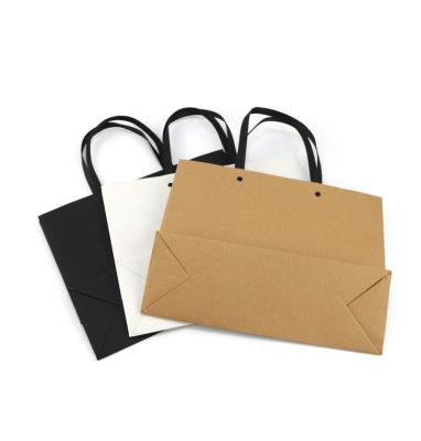 China Recycled materials wholesale custom logo gitf bages luxury shopping bag paper with handle for sale