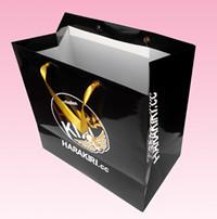 China custom paper bag supplier with gold stamping logo gold satin ribbon handle for sale