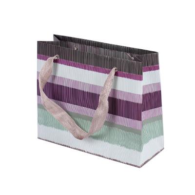 China custom printed black and white striped paper bag industry with handle eyelet for sale