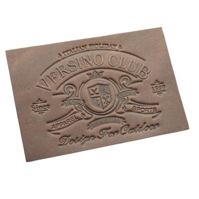 China custom leather clothing tags leather luggage labels embossed leather patches for sale