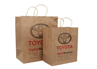 China Custom Printed Recycled Brown Kraft Merchandise Bags with Twisted Handles Factory for sale