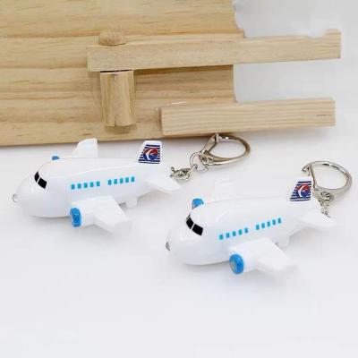 China Daily Life Gift Airplane LED Light Sounding Key Chain Car Luminous Phone The Small Gift Pendant Children's Toy for sale