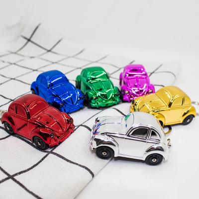 China Daily Life Manufacturers LED Spot Lights Car Classic Beetle Key Chain Ring Electroplating Healthy Luminous Children's Toys for sale