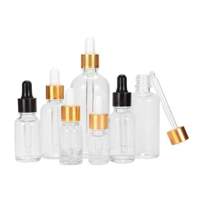 China Hot Selling Personal Care Glass Clear Essential Oil Bottle Empty Oil Dropper Bottles Clear Volume for sale