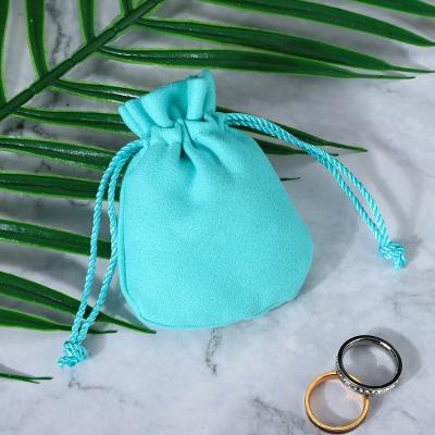 China Recyclable Green Drawstring Suede Bag Soft OEM ODM Velvet Fabric Gift Jewelry Packaging Pouch for sale