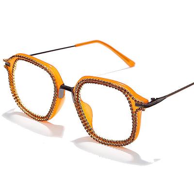 China Fashion Sunglasses 2022 Luxury Vintage Women Sunglasses Rhinestone Chain Colorful Lenses Frame Diamond Eyeglasses for sale