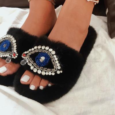 China CUSHIONING Free Sample 2021 Wholesale Soft Winter To Work Out Custom Logo Faux Stone Fur Slippers for sale