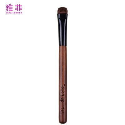 China T10 sombra de ojos ceja cabello negro pony maquillaje profesional cepillo multifuncional mango de madera en venta