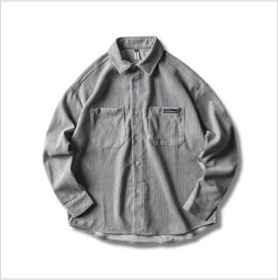 China Anti-pilling 2019 fashion mens clothes corduroy solid pockets loose casual plus size mens shirts for sale