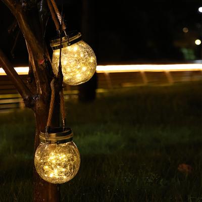 China Solar Powered Sunlight Hang Lights Garden Eco-Friendly LED Solar Slit Lamp Outdoor Waterproof Ball Light Waterproof Decoration for sale