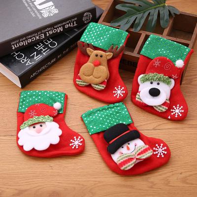 China Factory Direct Non-woven Fabric + Flannel Small Christmas Decorations Santa Claus Socks Christmas Tree Gift Bag Pendant Bag for sale