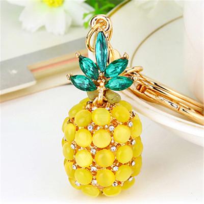 China Small Pineapple Moonstone Key Chain Car Promotion Gift Dangle Ring Metal Keychain Girl Small Gift Creative Luxury Metal Bag for sale