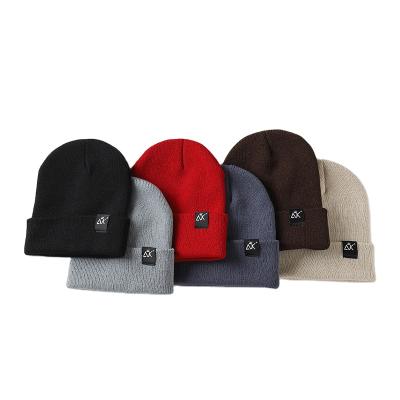 China COMMON Promotional Unisex Winter Cap Custom Slapped Winter Beanie Hats for sale