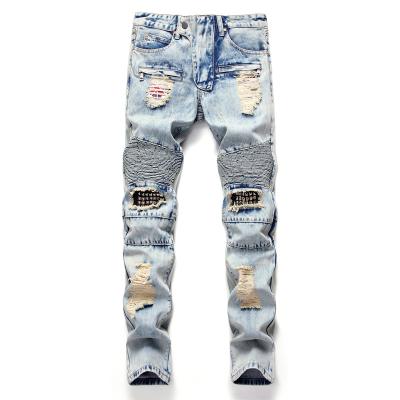 China Fried Snowflakes Hole Jeans Mens Breathable Fashionable Nostalgic Patch Us Patch Knee Rivet Mens Jeans Pants for sale