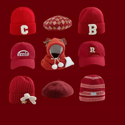 China 2022 Different Style Crossed Custom Cuff Knitted Beanie Winter Hat With Woven Logo Scarf Label for sale