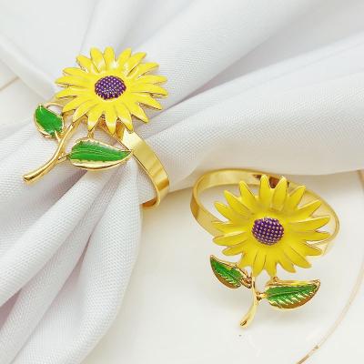 China Contracted Napkin Ring Wholesale Napkin Ring Sunflower Buckle Napkin Ring Hotel Tableware Zinc Alloy Napkin Ring for sale