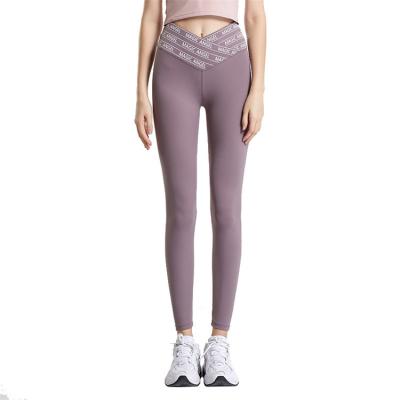 China 2022 Breathable Women V Cut Waist Stretchy Quick Dry Soft Compression Yoga Pants Wholesale for sale