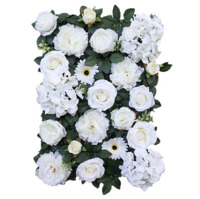 China New Design White Flower Wall Panel Artificial Silk Flower Silk Wedding Backdrop With Green Leaves for sale