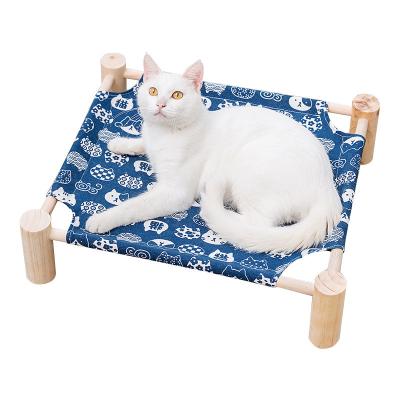 China Portable Cooling Wooden Cat Hammock Pet Beds Washable Cooling Plush Around Luxury Dog Bed for sale