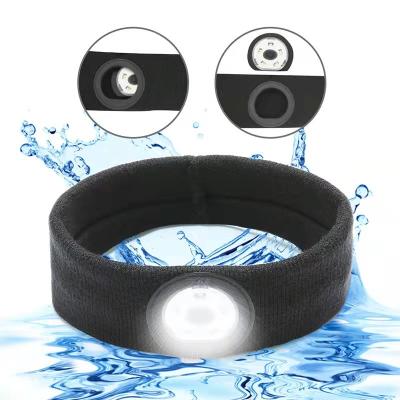 China Soft Night Sports LED Light Headband Unisex Outdoor Hat Yoga Sports Headband Running Recycling Earphone for sale