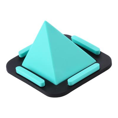 China Adjustable Silicone Pyramid Logo Desktop Cell Phone Holder OEM Universal For Iphone Samsung Stands Multi Angle Non Slip Desk Bracket for sale