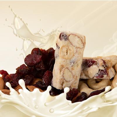 China Natural Delicious Molten Refined Milk Nougat Almond Pistachio Peanut Nuts Jujube Dried Fruit Snacks Milk Nougat For Cube Candy for sale