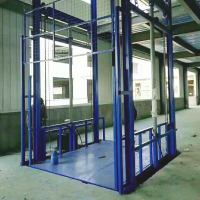 China Heavy Duty 3000kg Construction Material Stores Hydraulic Goods Lift Portable Small Cargo Lift Industrial Elevator For Warehouse for sale