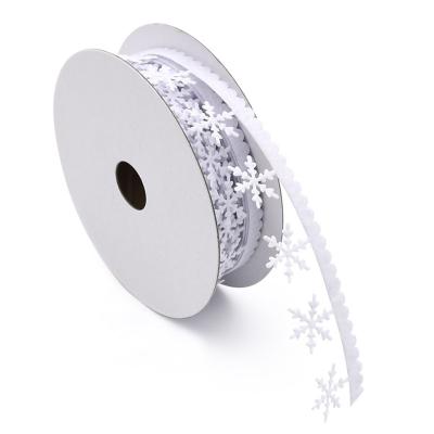 China Wholesale 5meters/lot 25mm Ultrasonic Embossed Christmas Decoration Snowflake Twine Lace Ribbon Viable Nonwoven Fabric Ribbon for sale