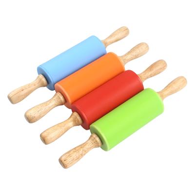 China Viable Customization Silicone Rolling Pin Small Size Dumpling Rolling Stick Solid Wood Handle Roller Pin Non-Stick Food Flour Stick for sale