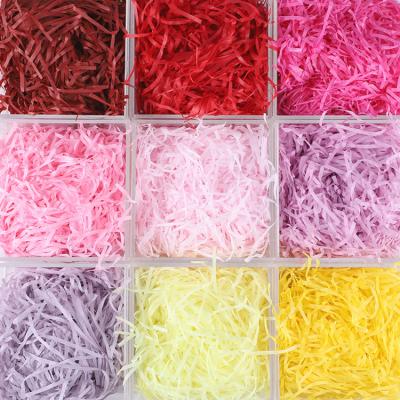 China Recycled Materials Wholesale High Quality Decorative Cosmetic Box Basket Filler Stuff Small Tissue Cut Cotton Kraft Paper Crinkle White Shredded Paper for sale