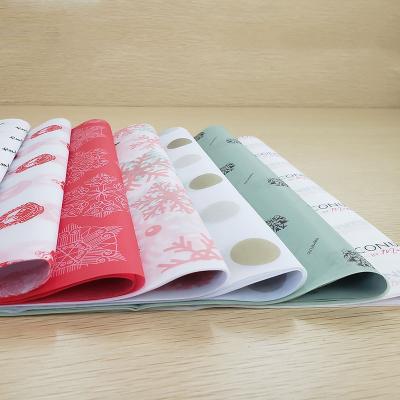 China Waterproof Custom Printed Logo 17G Foil Fabric Gift Paper Wrapping Paper , Wrapping Paper for sale