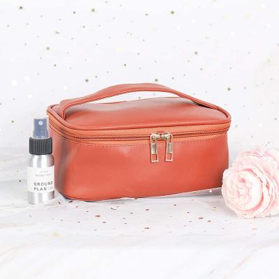 China Small Dress Makeup Bag For Purse PU Vegan Leather Travel Pouch Cosmetic Toiletry Bag For Women for sale