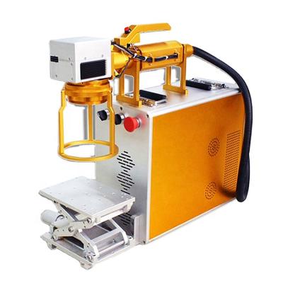 China Mini Mobile Fiber Laser CO2 Laser Marking Machine UV Laser Engraver Handheld Type for sale