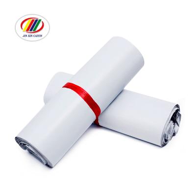 中国 Disposable Environmental Protective Waterproof Impact Resistance Manufacturer Stock Products Wholesale Customized Color Print Plastic Bag Destructive Sticker Wrap Wrapped LDPE Bag 販売のため