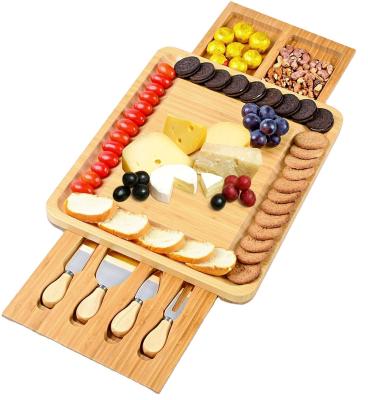 China Double Side Wooden Serving Tray Bamboo Cheese Board Hidden Drawer Cheese Servers for sale