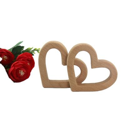 China heart- shaped Wooden baby Teether Natural Grasping Toy for sale