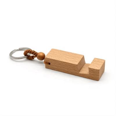 China Multifunctional Wooden Mobile Phone Holder Key Ring Fashion Simple for sale