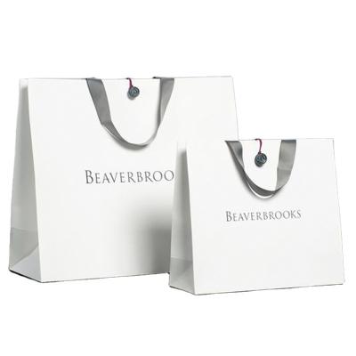 China Recyclable Printing Foldable White Kraft Paper Carrier Bag With Logo Manufacturer for sale