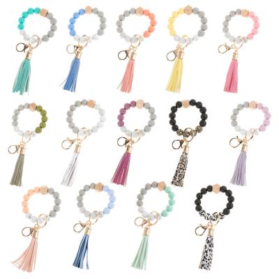 China JS 2021 advertising custom silicone beads elastic leather bracelet key chain tassel silicone beads bracelet key chain for sale