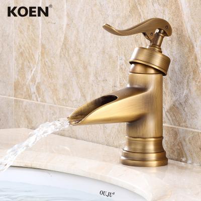 China Antique Brass Metered Taps Bathroom Basin Mixer Tap Faucet for sale